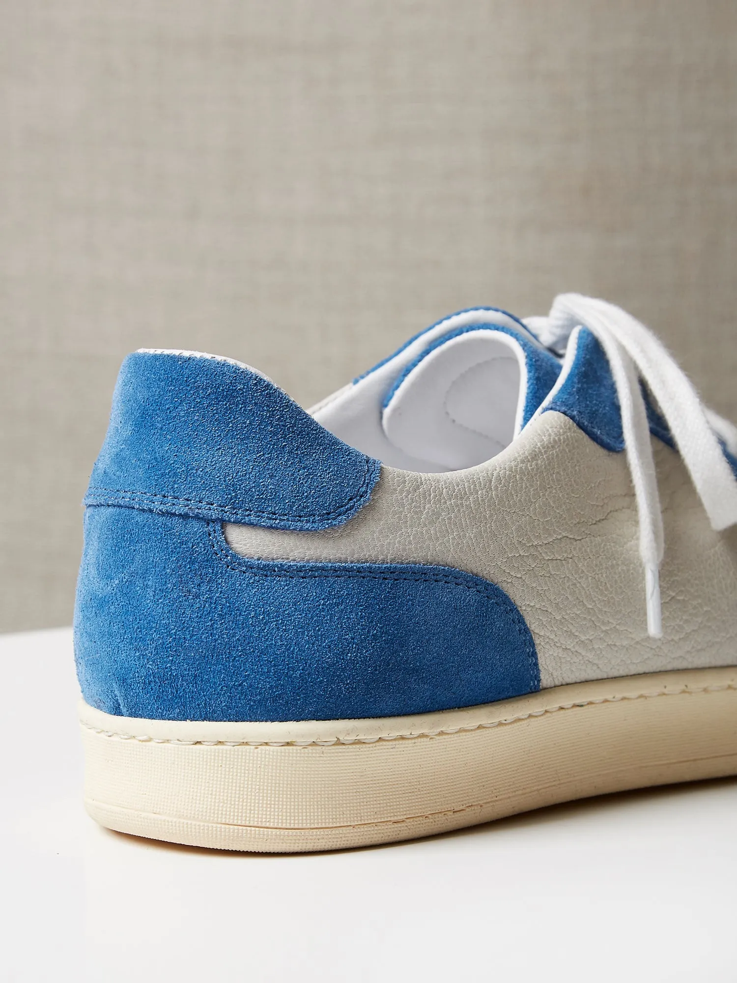 The Raf Sneaker with Blue Suede